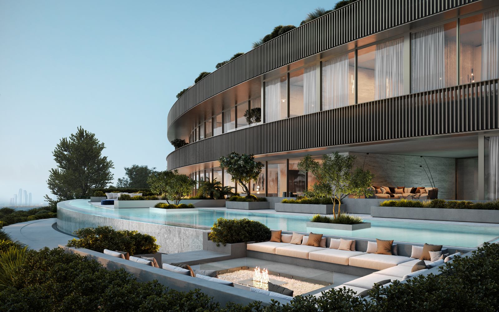Curved residence terraces above a lagoon-style pool and sunken lounge